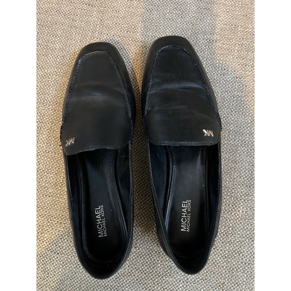 Michael Kors black leather loafers.